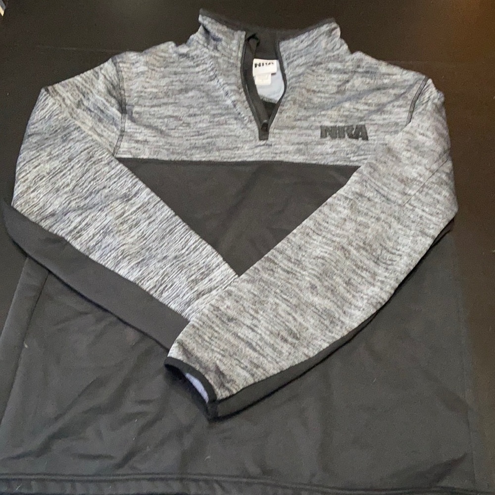 NRA official gear. Pull over. Worn twice.